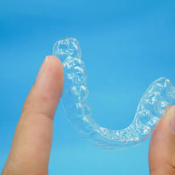 Invisalign trays next to case